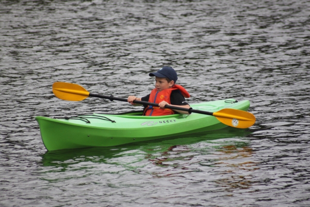 Child enjoys kayaking